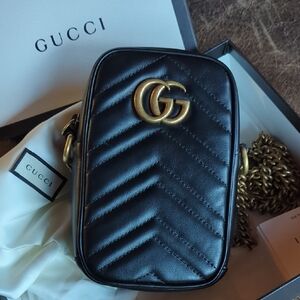Gucci Black Crossbody Bag with Quilted Leather and Gold Hardware